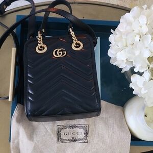 Gucci Black Mini Bag with Gold Accents